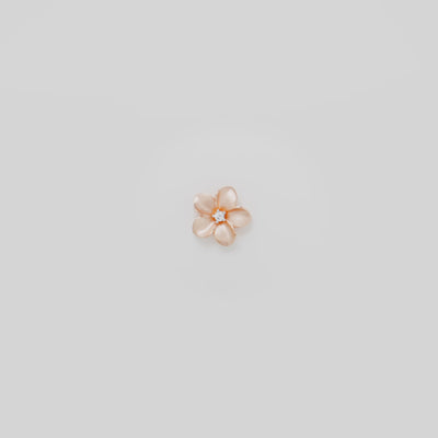 Video showcasing the 13mm Plumeria Pendant in 14k Rose Gold with Diamond on a turn table