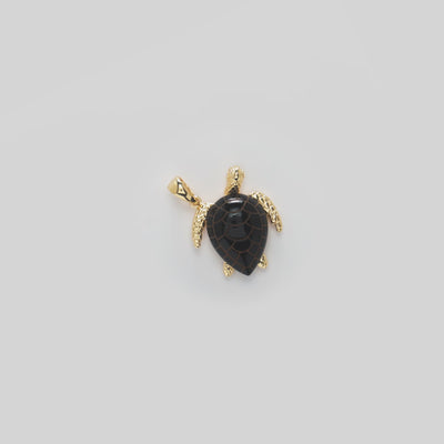 Video showcasing the 21mm Honu Black Coral Pendant in Gold with Diamonds 