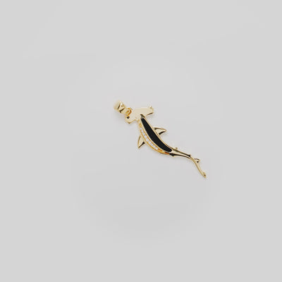 Video showcasing the 34mm Hammerhead Shark Black Coral Pendant in 14k Yellow Gold with Diamonds on a turn table