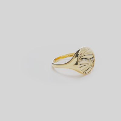 Vide of the Ocean Sand Signet Ring in 14k Yellow Gold with Diamonds on a White Background