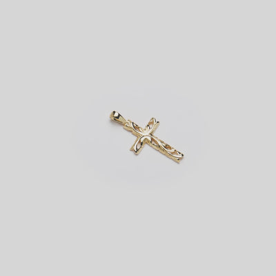 Video of the 24mm Hawaiian Heirloom Old English Scroll Cross Pendant in 14k Yellow Gold turning on a white background