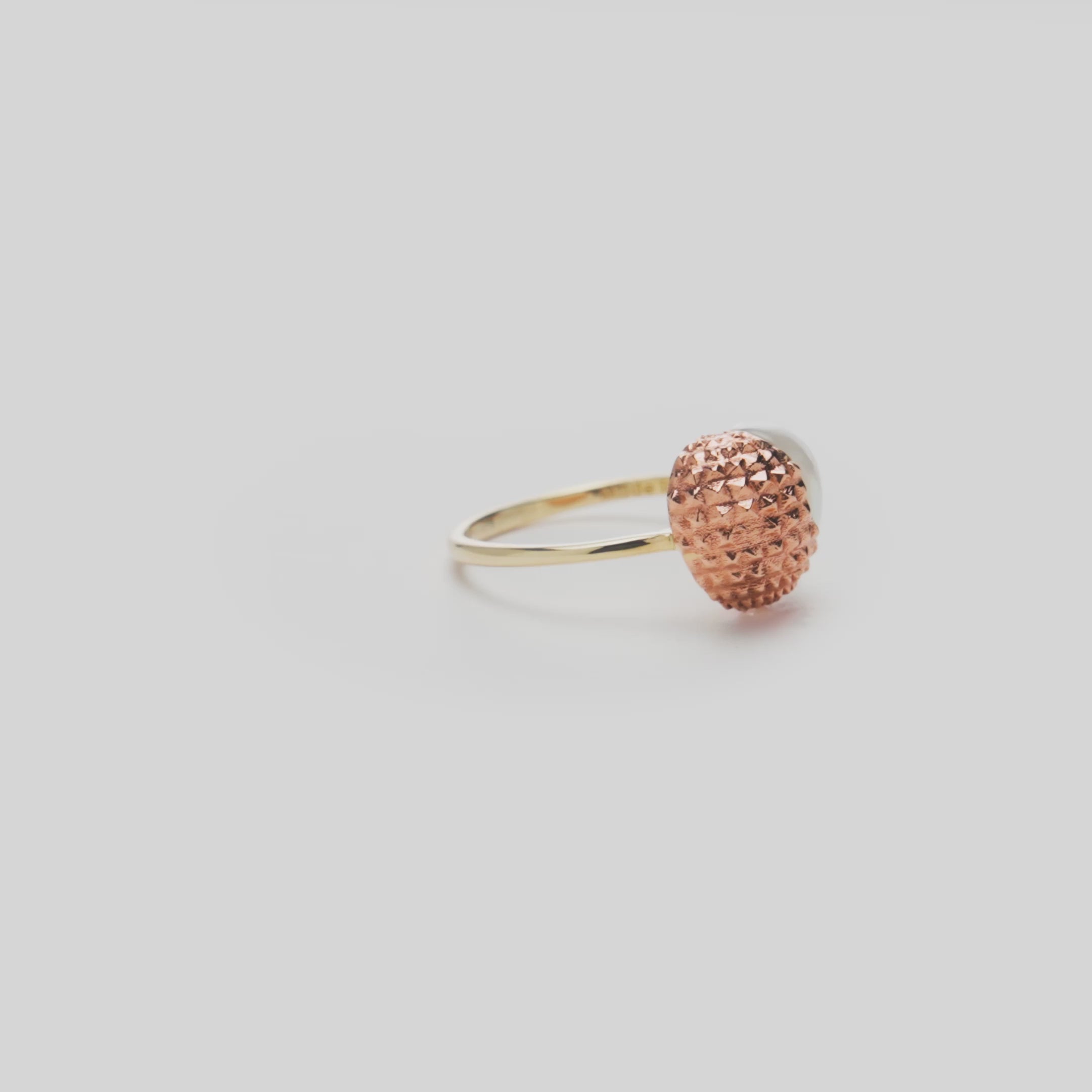 Video showcasing the 1mm Lychee Mother of Pearl Ring in 14k Two Tone Gold