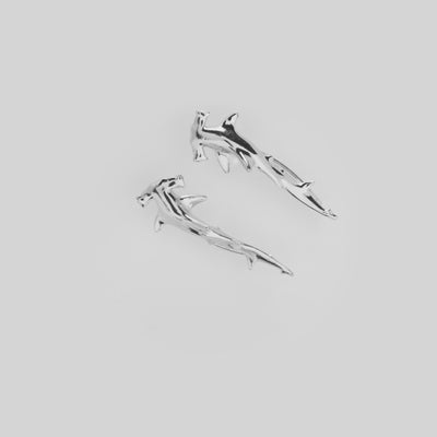 Video showcasing the Hammerhead Shark Climber Earrings in Sterling Silver on a turn table