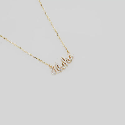 Video of the 16" Aloha Necklace in Gold with Diamonds turning on a white background