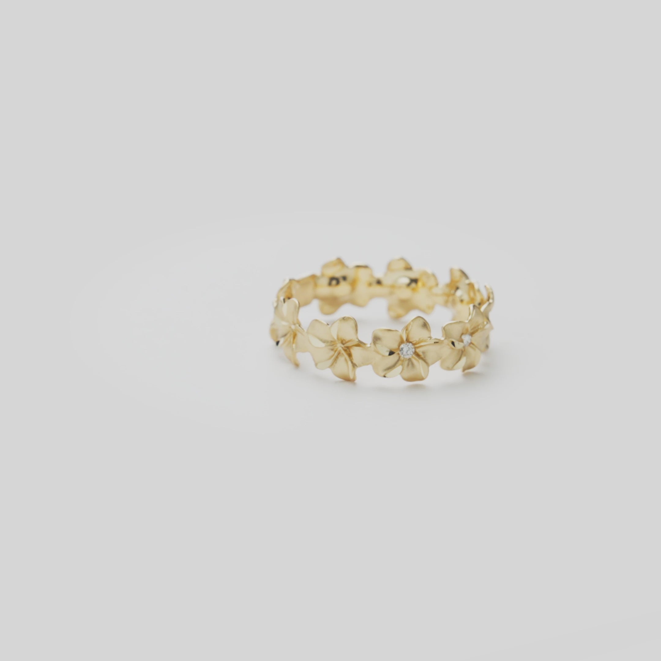 Video showcasing the 6mm Plumeria Eternity Ring in 14k Yellow Gold with Diamonds