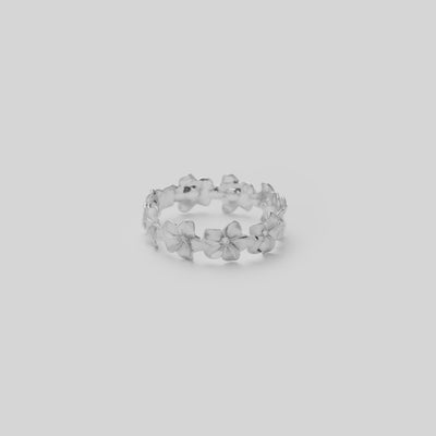 Video showcasing the Plumeria Eternity Ring in 14k White Gold with Diamonds