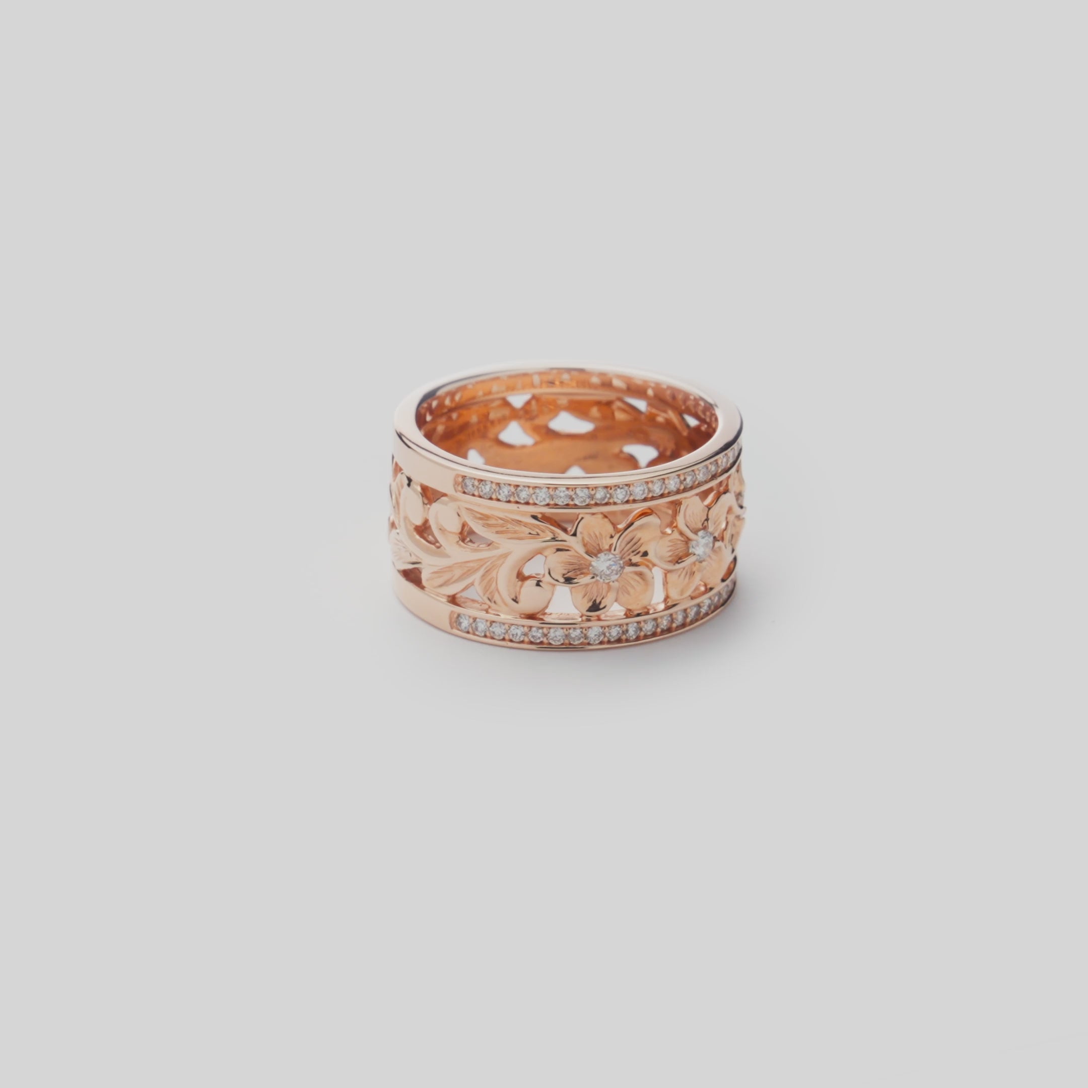 Video showcasing the 10mm Hawaiian Heirloom Plumeria Ring in Rose Gold with Diamonds