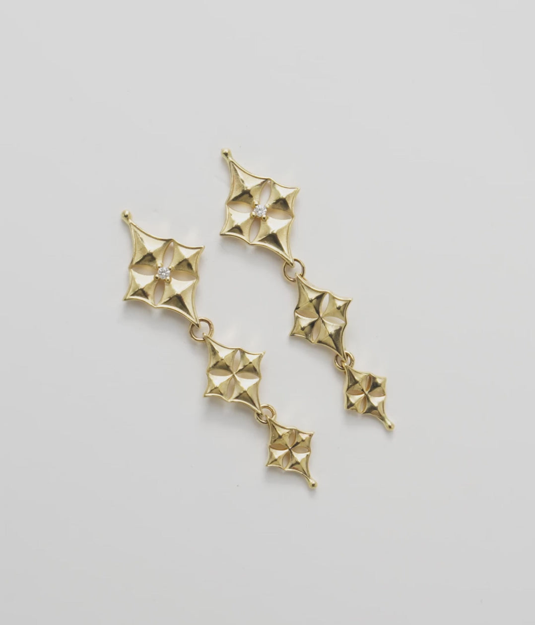 Video showcasing the 34mm Hawaiian Quilted Star Earrings in Gold with Diamonds
