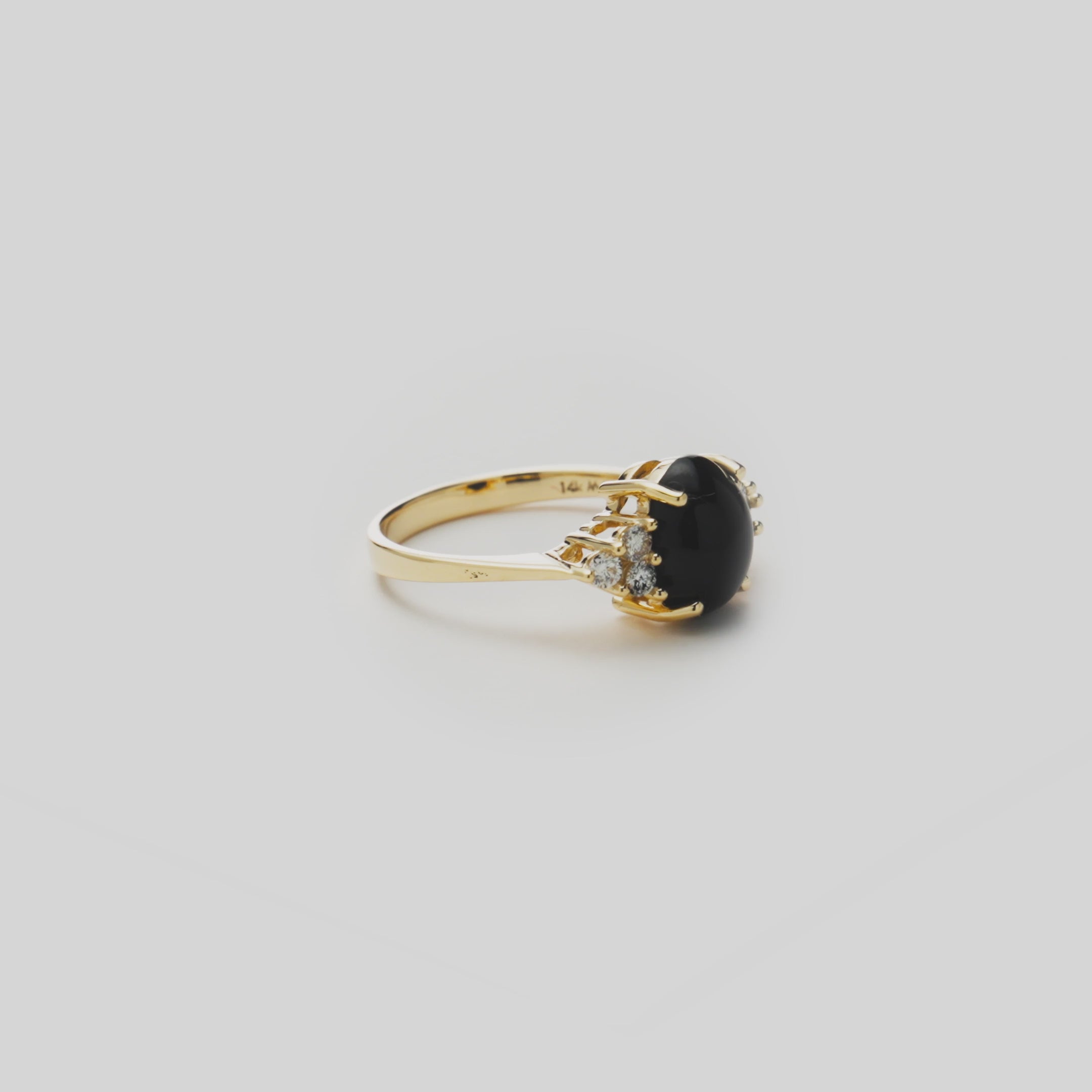 Video showcasing the Black Coral Ring in 14k Yellow Gold with Diamonds
