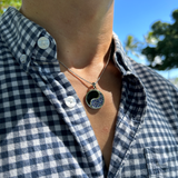 A man wearing a 16"-22" Adjustable 1mm Rope Chain in 14K White Gold with a Yin Yang Pendant- Maui Divers Jewelry