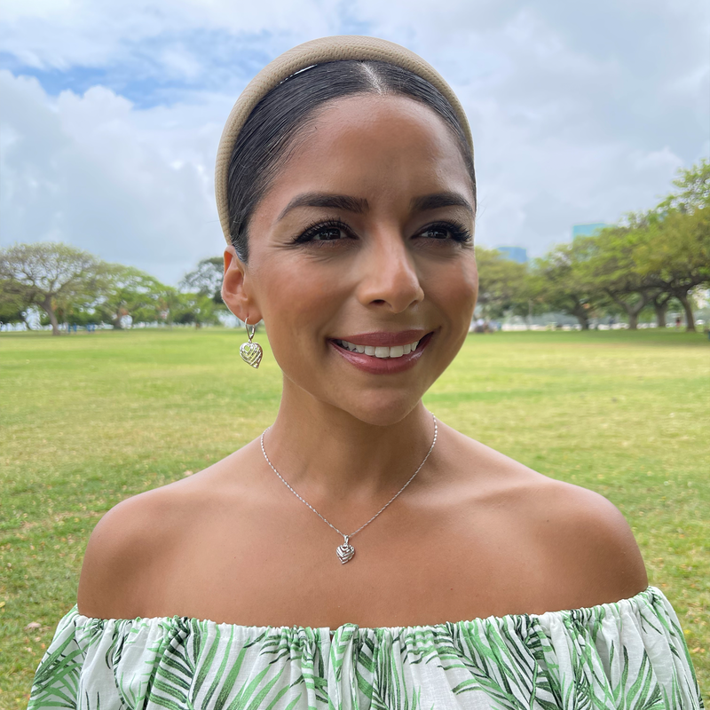 A woman wearing Aloha Heart Earrings in Sterling Silver - 18mm - Maui Divers Jewelry