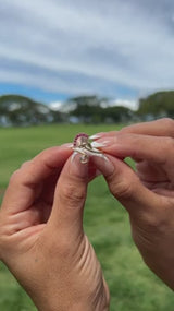 Video of a woman's hand wearing a Ohia Lehua Ruby Ring in Two Tone Gold with Diamond - 18mm