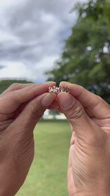 Video of a woman's hand wearing a Plumeria Eternity Ring in Rose Gold with Diamonds - 6mm-Maui Divers Jewelry