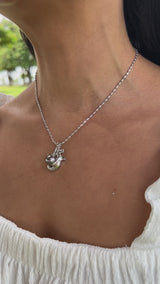 Video of a woman wearing a Tahitian Black Pearl Hammerhead Shark Pendant in White Gold - 9-10mm - Maui Divers Jewelry