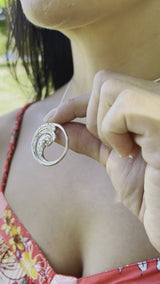 Video of a woman wearing a Nalu Necklace in Sterling Silver - 30mm - Maui divers Jewelry
