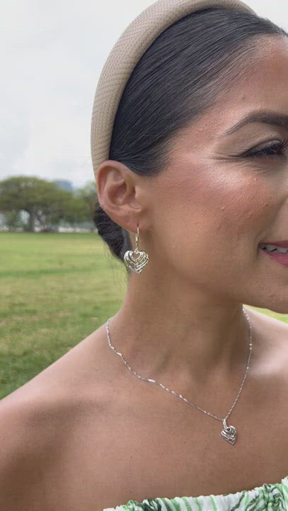Video of a woman wearing Aloha Heart Earrings in Sterling Silver - 18mm - Maui Divers Jewelry
