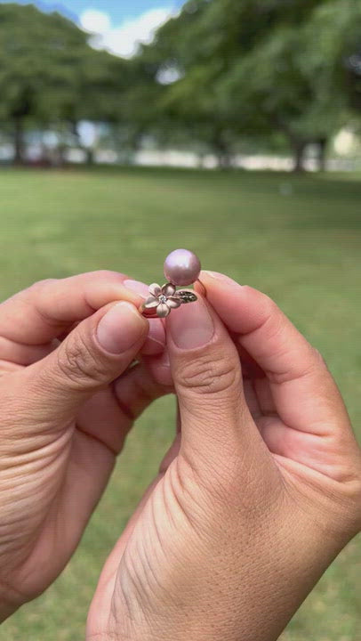 Video of a woman's hand wearing a Plumeria Lilac Freshwater Pearl Ring in Rose Gold - Maui Divers Jewelry