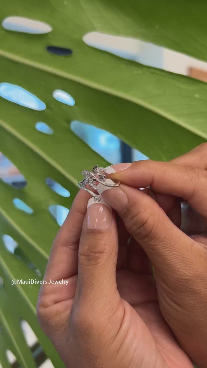 Video of a woman's hand wearing a Palm Tree Ring in White Gold with Diamonds - 18mm - Maui Divers Jewelry