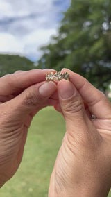 Video of a woman's hand wearing a Plumeria Eternity Ring in Gold with Diamonds- 6mm - Maui Divers Jewelry