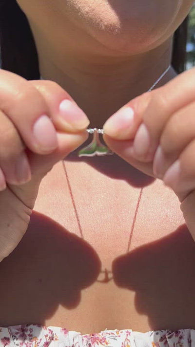 Video of a woman wearing a 18" Whale Tail Necklace in Sterling Silver - 13mm - Maui Divers Jewelry