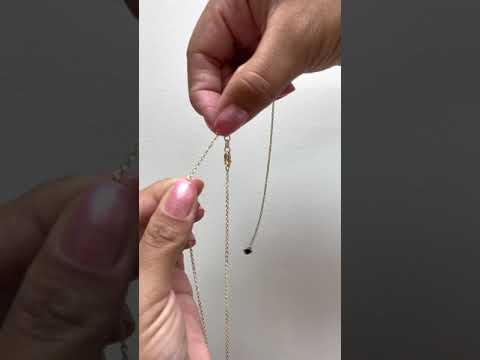 Video of a woman showing how to adjust a 1.0mm Cable Chain in Gold - Maui Divers Jewelry