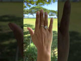 Video product of a woman's hand wearing a Plumeria Ring in Two Tone Gold with Diamond - 5mm - Maui Divers Jewelry
