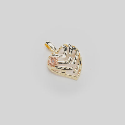 Video of the Aloha Heart Pendant in 14k Yellow Gold with a Diamond Accented Plumeria in 14k Rose Gold on a White Background